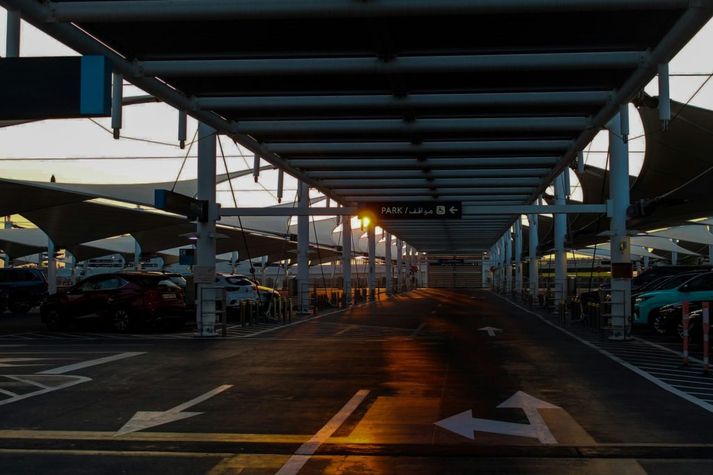 A view of an empty parking lot at sunset